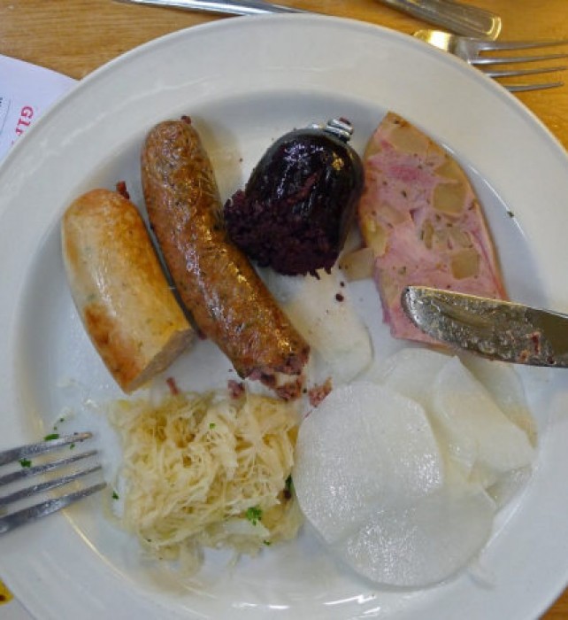 Saturday LUNCH Wursts radishes and sauercraut on my plate.