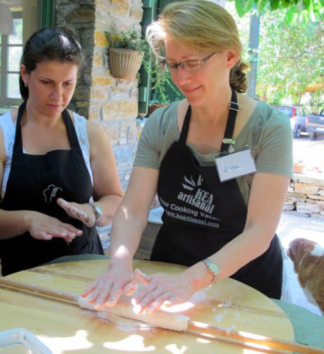 Anne Mitchell rolling phyllo for our crunchy cheese pie, under Ela’s supervision.